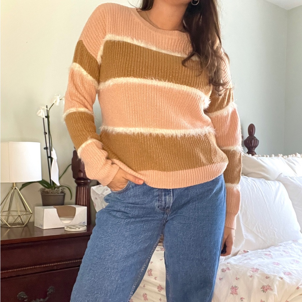 Pink and brown striped sweater with white fuzzy details